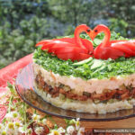 Слоёный салат «Лебединая верность» с курицей и шампиньонами
